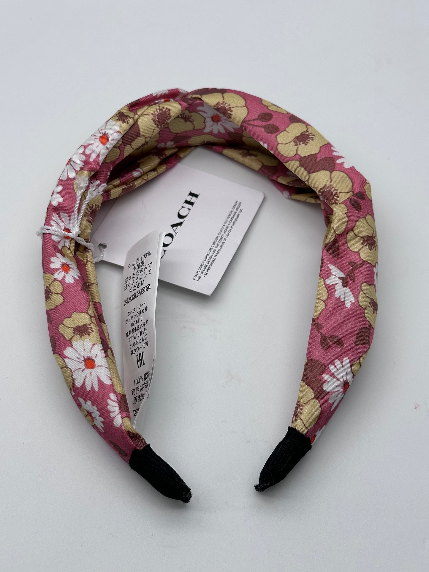 Coach diadema de flores