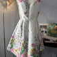 Vestido blanco con flores. Talla M